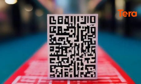 A close-up of a QR code with a blurred background featuring a red pathway, symbolizing digital scanning or data access.